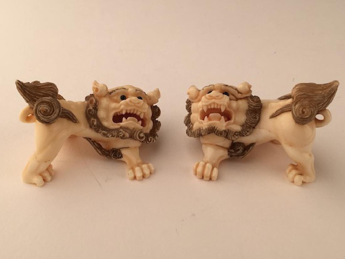 Two carved Food dog netsukes. Signed. Length 1 3/4 (1 of 8)