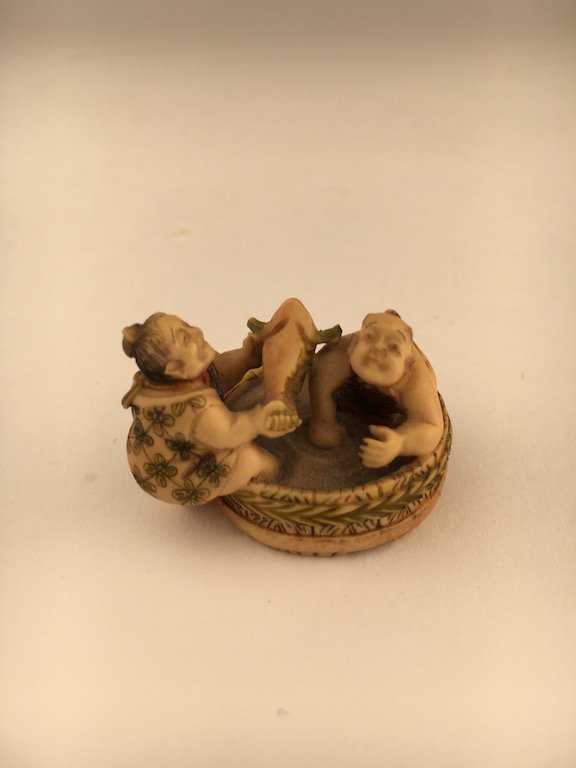 Carved netsuke figure of two fishermen (1 of 3)