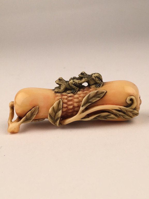 Carved netsuke figure of two small frogs on a stalk (1 of 4)