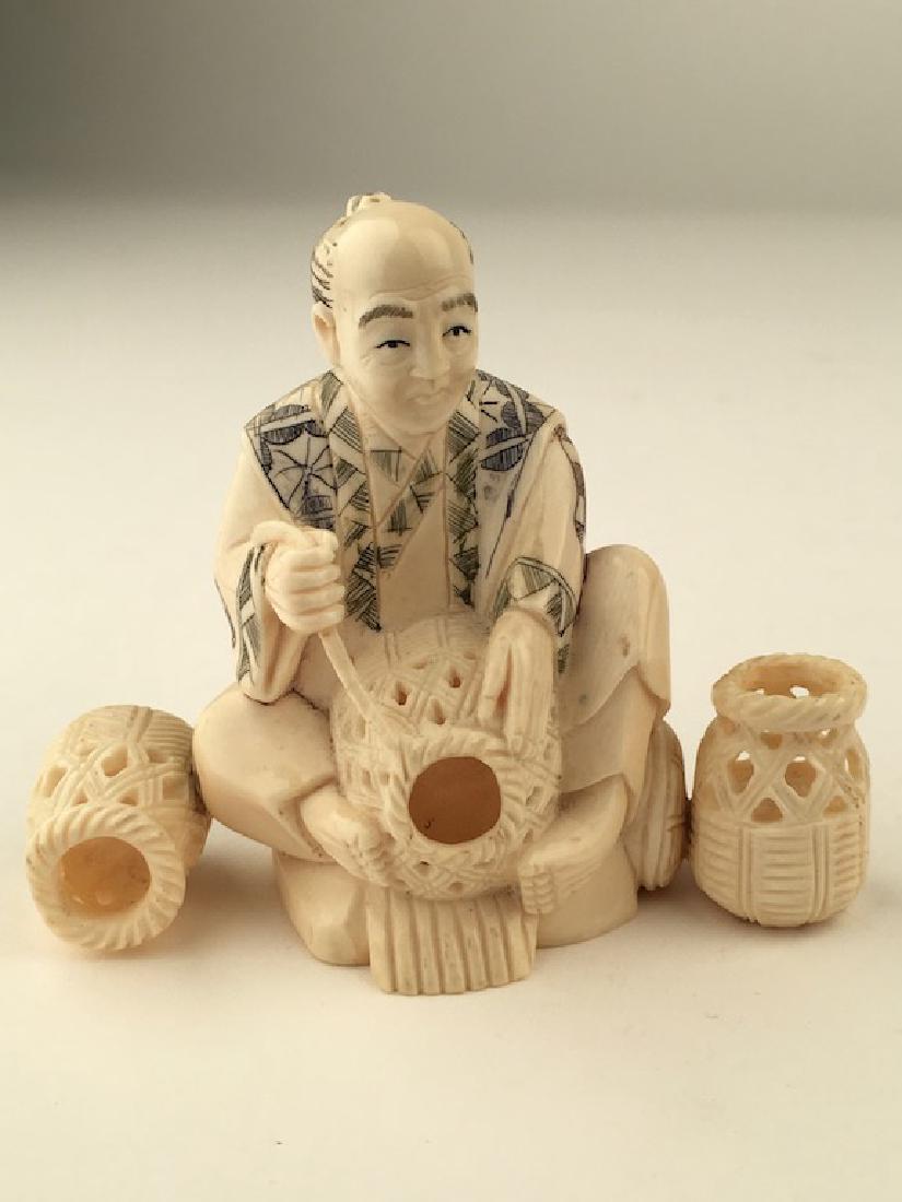 Carved Okimono figure seated and making baskets. SIgned (1 of 7)