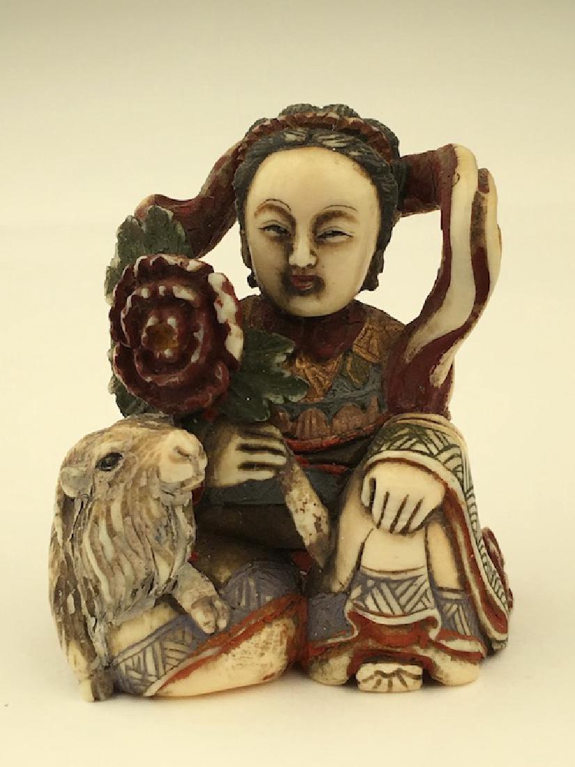 Antique carved Netsuke figure of a lady sitting next to (1 of 5)