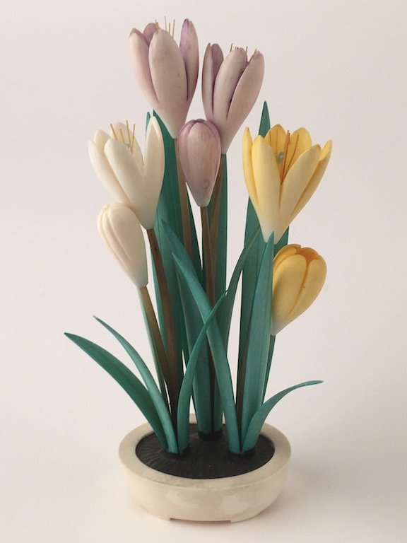 Carved 3 stalks of flowers in a small pot. (1 of 4)