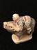 Carved Netsuke figure of a man on the back of a boar. - 2