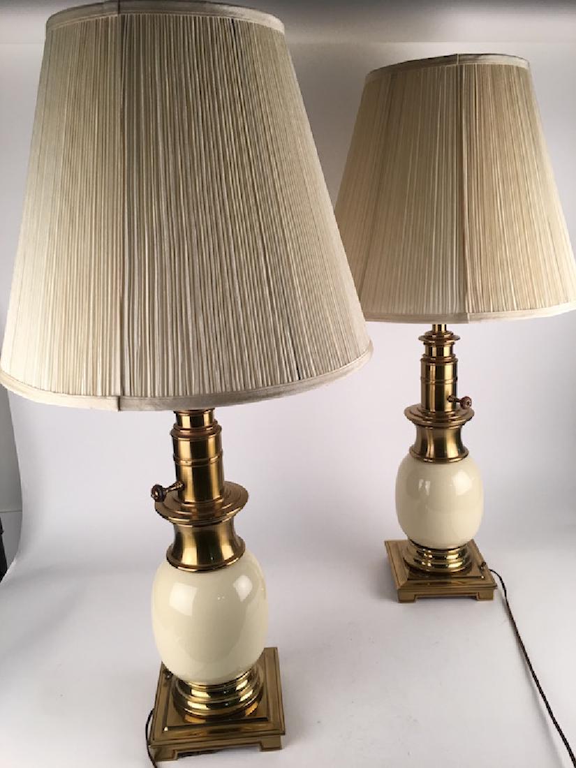 A pair of vintage porcelain and brass table lamps. (1 of 4)