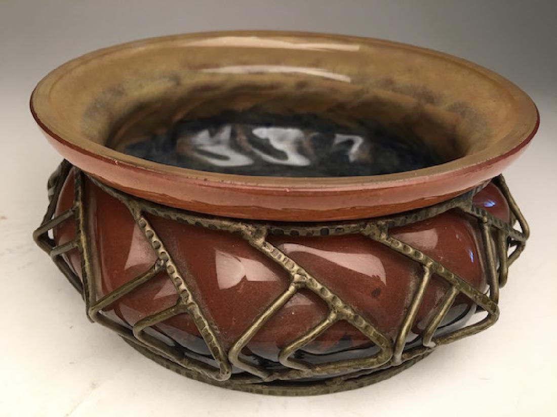 Daum and Majorelle Art Nouveau blown glass bowl: Daum and Majorelle Art Nouveau blown glass bowl with metal frame.Signed Daum Nancy France also signed L. Majorell with the Cross of Lorraine.Diameter 8 inches. Height 3 1/4 inches.