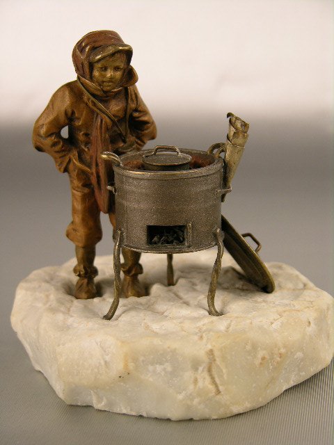 BRONZE: CHESTNUT VENDOR BY BERGMAN.
