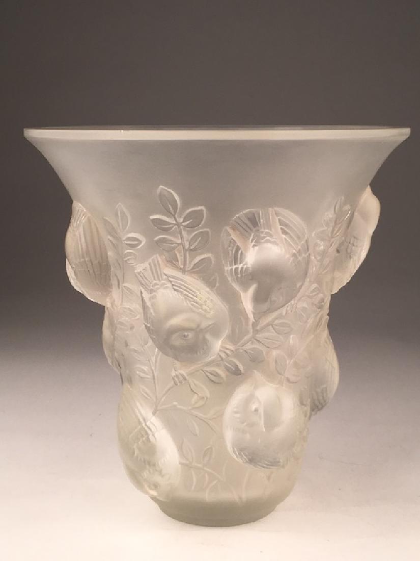 R. Lalique "St. Francois" vase in clear and frosty: R. Lalique "St. Francois" vase in clear and frosty glass. Acid etched "R. Lalique France " on the bottom Height 6 7/8 inches. Reference; R. Lalique by Felix Marcilhac, page 450. (Very minor flea chip 