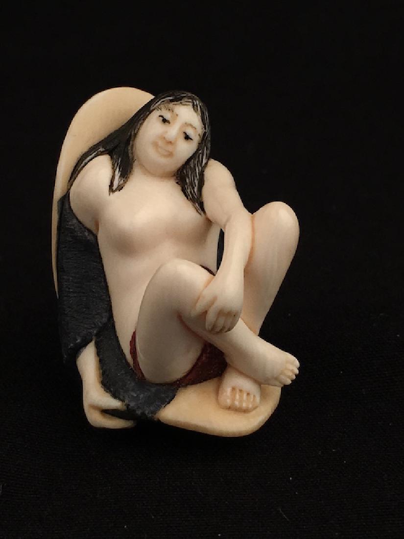 Carved netsuke figure. (1 of 4)
