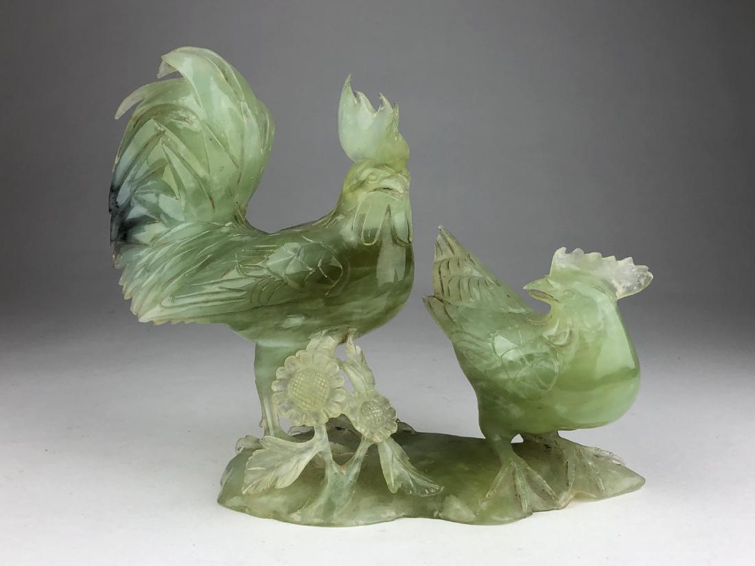 Antique green jade carving of a rooster and a chicken.: Antique green jade carving of a rooster and a chicken. Height 6 inches length 9 inches. (Chip to bottom of base, see photo).