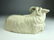 A wonderful porcelain model of a reclining goat in a hi - 6
