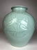 A very large porcelain baluster vase highly chased deco