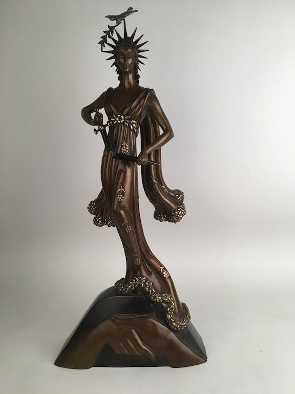 Erte (Romain de Tirtoff, French, 1892-1990). "Peace": Erte (Romain de Tirtoff, French, 1892-1990).A cold painted bronze figurine titled "Peace".A standing woman with a sword and a Doves of Peace as a headress on a pedastal with hands shaking representing
