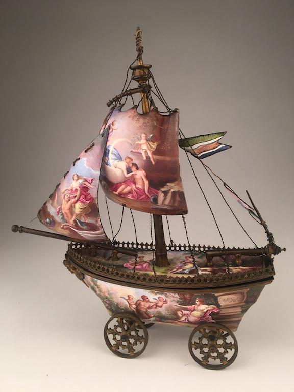 Vienna enamel painted bronze sail vessel.: Vienna enamel painted bronze sail vessel.The top deck lifts off to reveal an compartment.Height 9 1/8 inches. Length 8 inches.