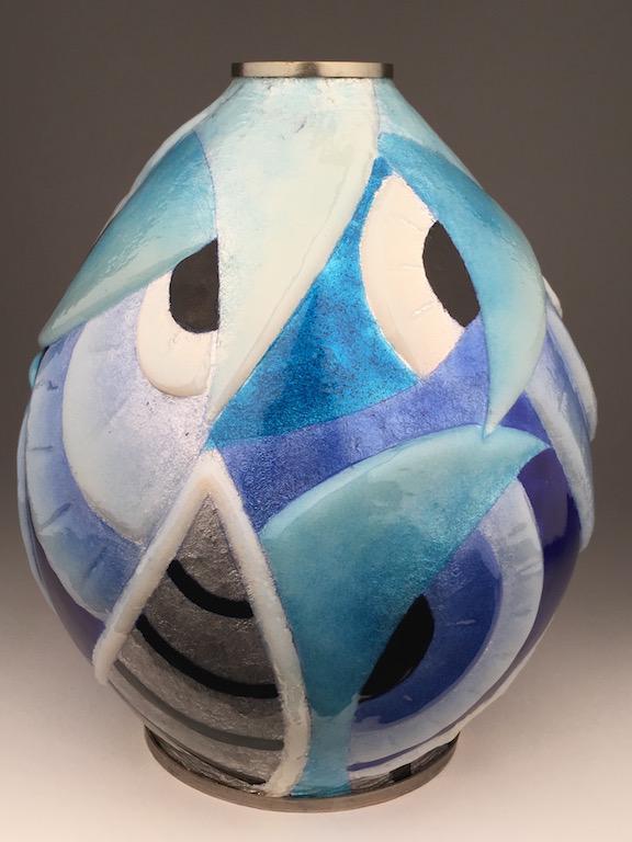 Camille Faure technique Limoges enamel in a geometic: Camille Faure technique Limoges enamel in a geometic shape on copper vase in a large boulbous shape coming to a narrow opening.Signed M. Pinoteau Limoges.(Mauricette Pinoteau:French).Height 9 1/2 inch