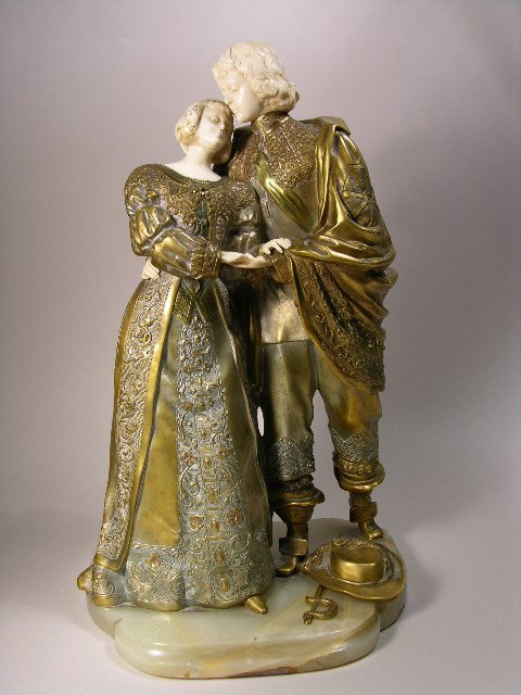 MARQUET BRONZE AND IVORY FIGURINE.