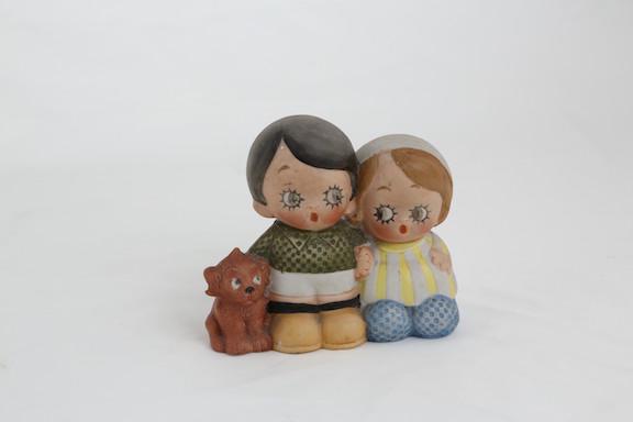 SHAFER AND VATER FIGURINE.: SHAFER AND VATER (GERMAN) FIGURINE OF A LITTLE BOY AND GIRL WITH THEIR LITTLE DOG. HEIGHT 4". CIRCA 1920.
