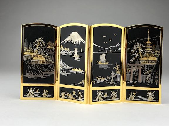 Vintage Japanese damascene folding miniature four panel: Vintage Japanese damascene folding miniature four panel table screen decorated with 24 kt inlaid gold and silver decoration of villages with Mount Fuji in the background with the back decorated with a