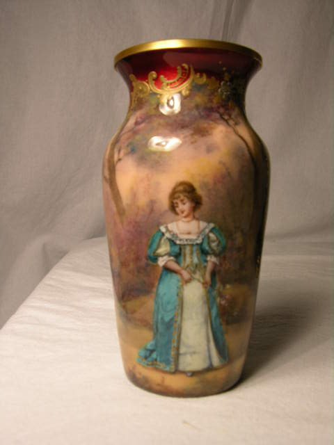 SMALL HAND ENAMELED VASE. A WOMAN AMID A FOREST