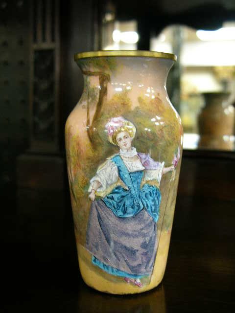 FRENCH HAND PAINTED ENAMEL VASE. A WOMEN WALKING