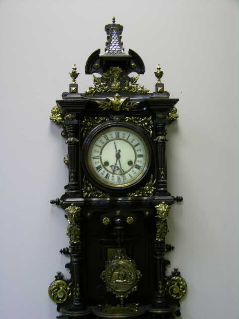 ANTIQUE WALL CLOCK WITH PENDULUM. OVERALL LENGTH - 2