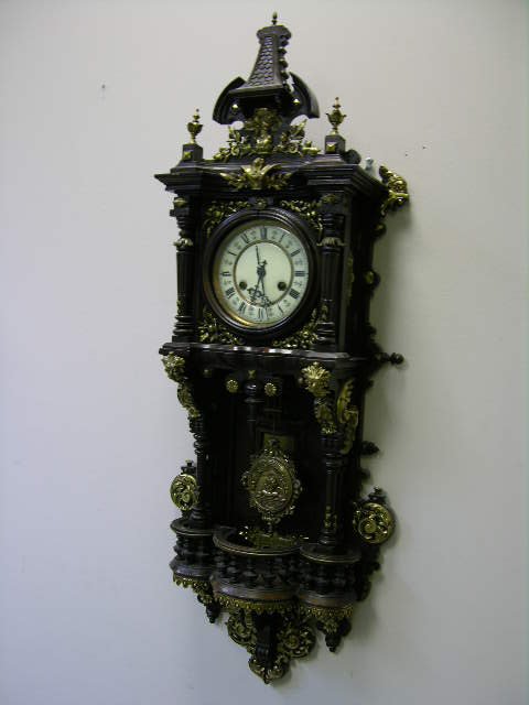 ANTIQUE WALL CLOCK WITH PENDULUM. OVERALL LENGTH - 4