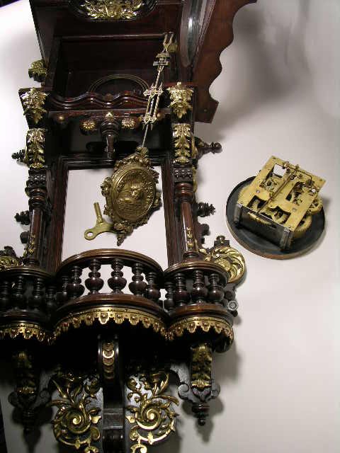 ANTIQUE WALL CLOCK WITH PENDULUM. OVERALL LENGTH - 5