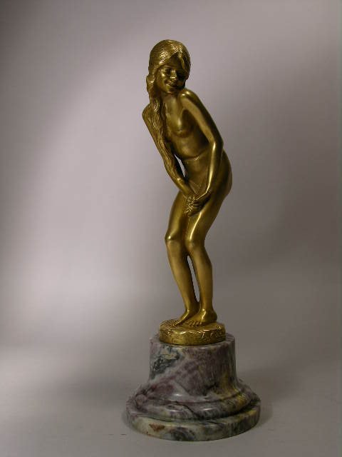 A. CARON: GILT BRONZE FIGURE OF A NUDE.