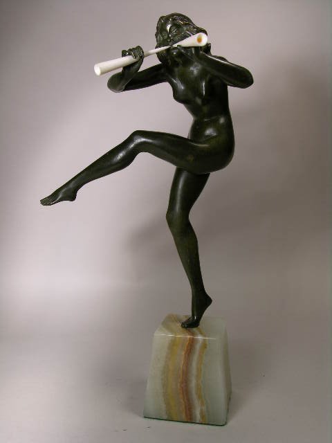 BRONZE FIGURE OF NUDE PLAYING TWO FLUTES.
