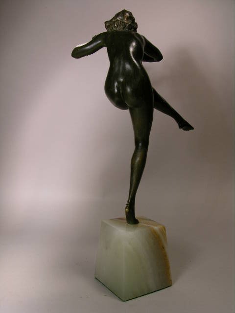 BRONZE FIGURE OF NUDE PLAYING TWO FLUTES. - 3