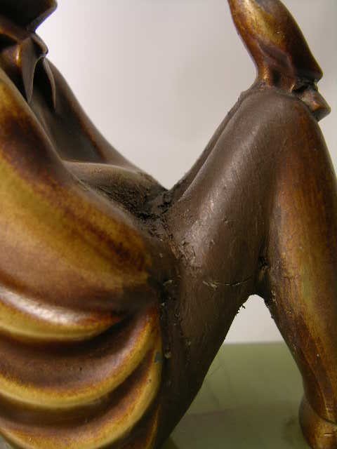 ROLAND PARIS BOOK ENDS. - 3