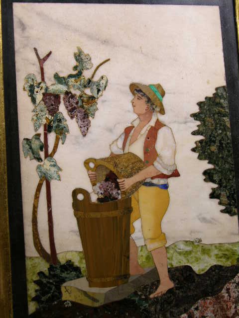 PIETRA DURA PLAQUE OF A MAN POURING A BATCH OF GR - 2