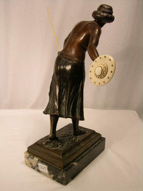 BRONZE CARVED FIGURE OF A FEMALE WARRIOR. - 5