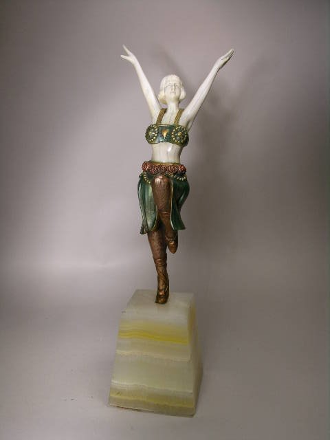 GILT BRONZE FIGURE OF A DANCER.