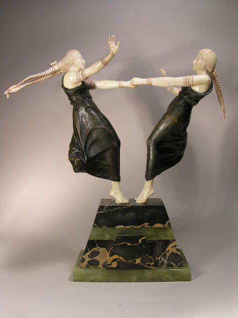 A. GILBERT: BRONZE SCULPTURE OF TWO YOUNG GIRLS.