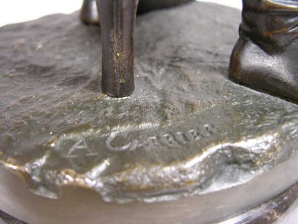 A. CARRIER BRONZE FIGURE OF A MAN WITH WEAPON. - 4