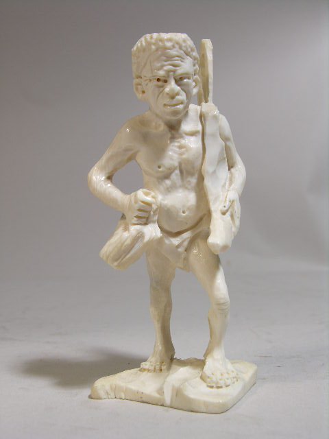 CARVED IVORY Carved ivory of an African Bushman,