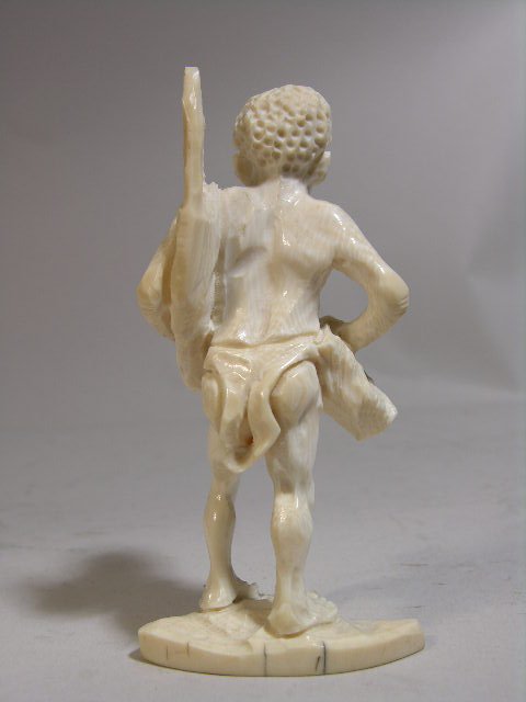 CARVED IVORY Carved ivory of an African Bushman, - 2