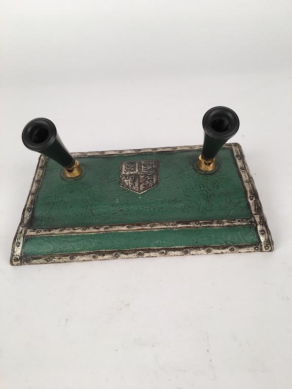 Tiffany double pen holder in the "Heraldic" pattern.: Tiffany double pen holder in the "Heraldic" pattern in green. Stamped "Tiffany Studios New York 2116". Base measures 7 1/2" across, 4 1/2" deep". Circa 1910.