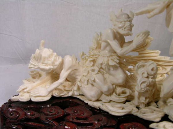 ANTIQUE CHINESE CARVING OF THREE FIGURES. A LARG