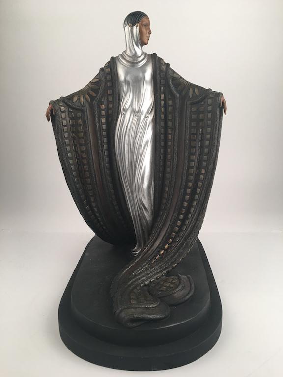 Romain de Tirtoff (23 November 1892 - 21 April 1990),: Romain de Tirtoff (23 November 1892 - 21 April 1990), was a Russian-born French artist and designer known by the pseudonym Erté. Bronze figure titled "La Mysteriuese".A beautiful lady wearing a long