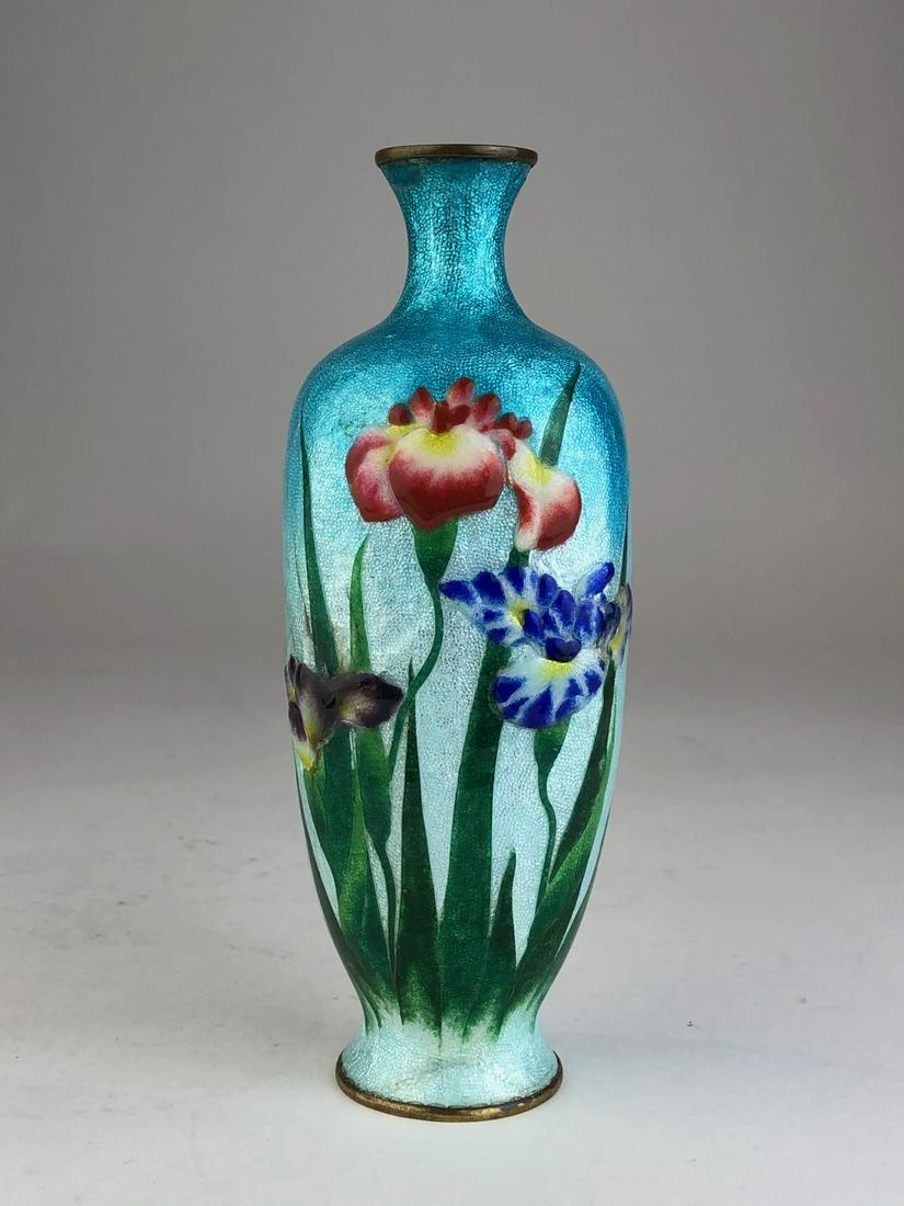 Japanese moriage cloisonne vase with bronze mounts.: Japanese moriage cloisonne vase with bronze mounts. Decorated with bright colorful flowers on gradualed grey blue foil. Circa 1920. Height 6 1/4 inches. Diameter 2 3/8 inches. (Some oxidation to foil,
