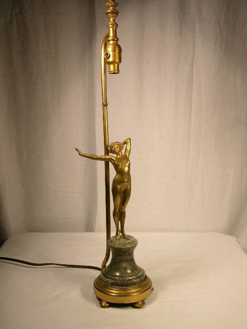 P. PHILIPPE ART NOUVEAU TABLE LIGHTING WITH A GOL: ART NOUVEAU TABLE LIGHT WITH A GOLD GILT BRONZE FIGURE OF A NUDE WOMAN MOUNTED ON A GREEN MARBLE BASE SUPPORTED BY FIVE SMALL BUNN FEET. SIGNED "P. PHILIPPE" ON THE TOP OF THE BASE. ALSO "MADE IN FRAN