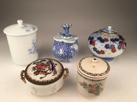 Oriental collection of five jars and covers. Tallest 5: Oriental collection of five jars and covers. Tallest 5 inches. (Some covers do not fit snugg).