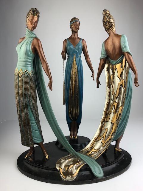Erte (Romain de Tirtoff, French, 1892-1990). "Three: Erte (Romain de Tirtoff, French, 1892-1990).A cold painted bronze figurine titled "Three Graces".Signed in the base "171/370 Fine Art Acquisitions 1987".Overall height 15 3/4 inches.