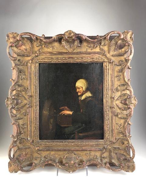 Oil on canvas of an old lady spinning yard. Plaque: Oil on canvas of an old lady spinning yard. Plaque reads G. Metsu 1629-1667. Canvas measures 9 inches x 10 inches. Framed 16 inches x 18 inches.