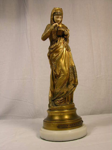 A. CARRIER BELLEUSE (ALBERT ERNEST BELLEUSE:FRENCH: A. CARRIER BELLEUSE (ALBERT ERNEST BELLEUSE:FRENCH 1824-1887). BRONZE AND IVORY TITLED "THE READER". SIGNED "A. CARRIER BELLEUSE" IN THE BRONZE. FRONT PLATE READS "LISEUSE" "PAR CARRIER BELLEUSE DE PR