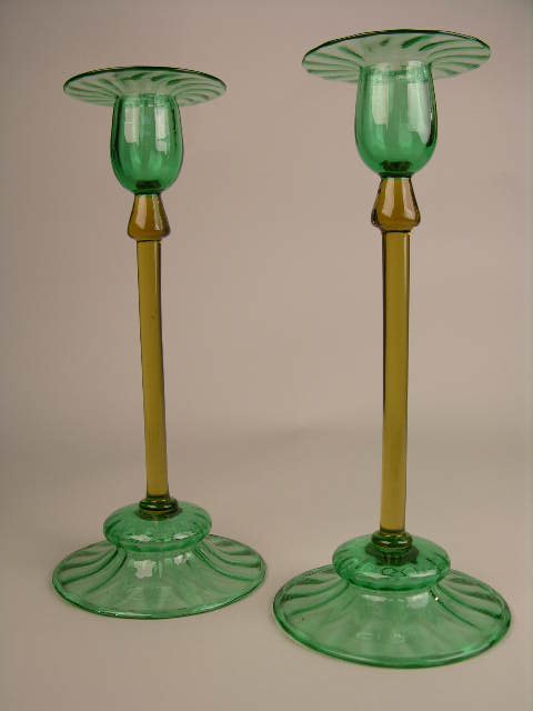 PAIR OF STEUBEN ART GLASS CANDLESTICKS.
