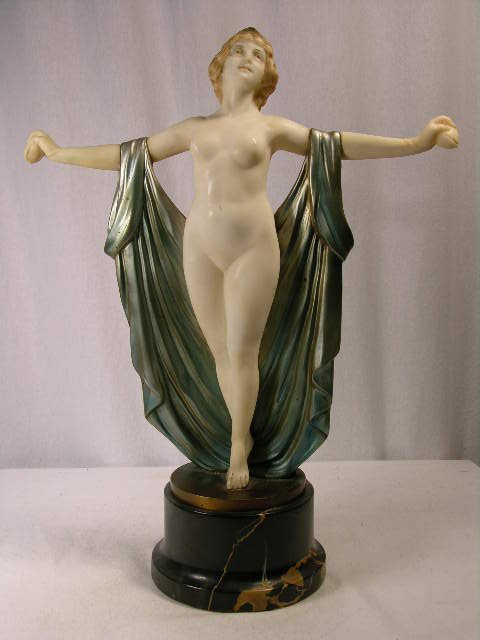 ALABASTER AND SILVERED BRONZE FIGURE OF A WOMAN WIT