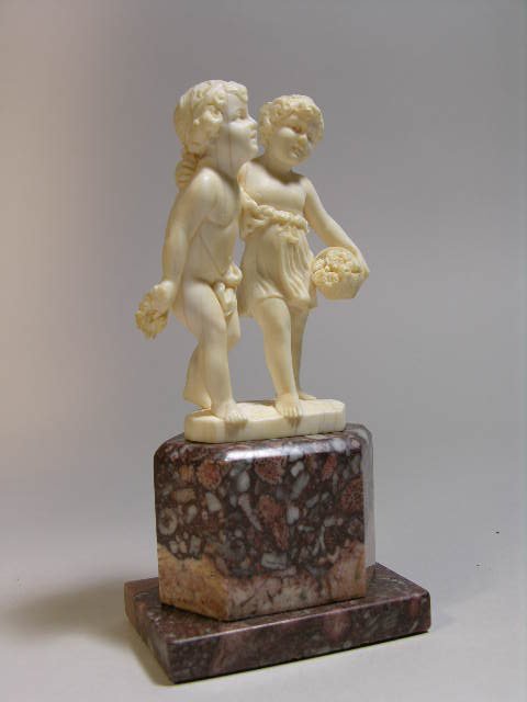 F. PREISS: FIGURINE OF TWO YOUNG CHERUBS.