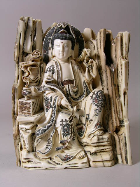 ANTIQUE MAMMOTH IVORY CARVING.